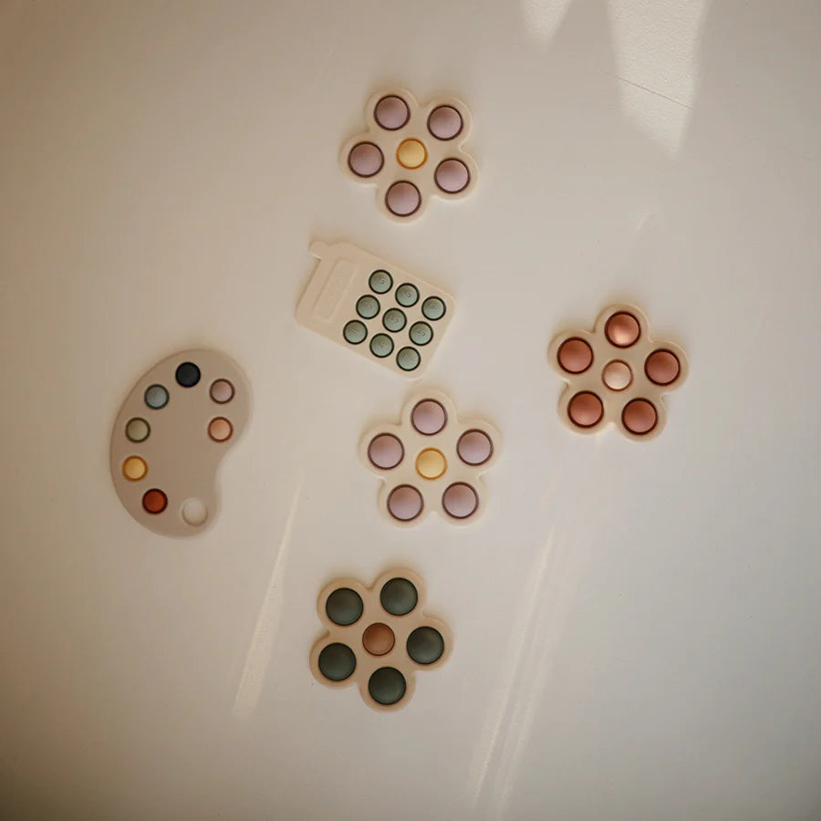 Mushie - Pop-it-Spielzeug "Flower"